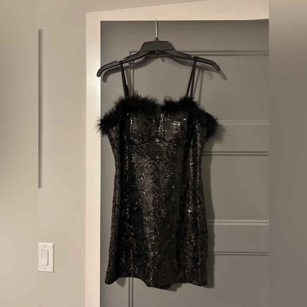Black feather and sequins homecoming dress.